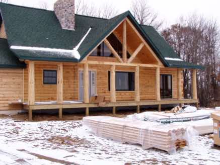 An awesome porch on a full log home east of St. Cloud, MN
