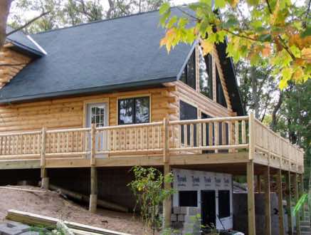A close up view of the log cabin on Yellow Lake
