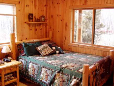 Vertical knotty pine on the bedroom walls