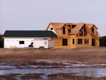 A full log home under construction