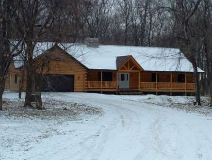 A full log ranch style home in southern Minnesota
