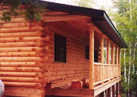 900 sq. ft. full log cabin with a great porch overlooking the river